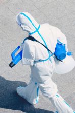 Person in hazmat suit during COVID quarantine 