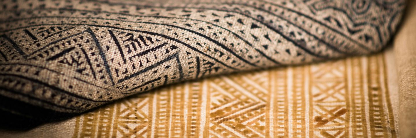 Close up texture of two different patterned rugs